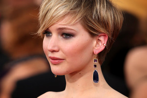 Jennifer Lawrence arrives at the 20th annual Screen Actors Guild Awards at the Shrine Auditorium on Saturday, Jan. 18, 2014, in Los Angeles. (Photo by Paul A. Hebert/Invision/AP)